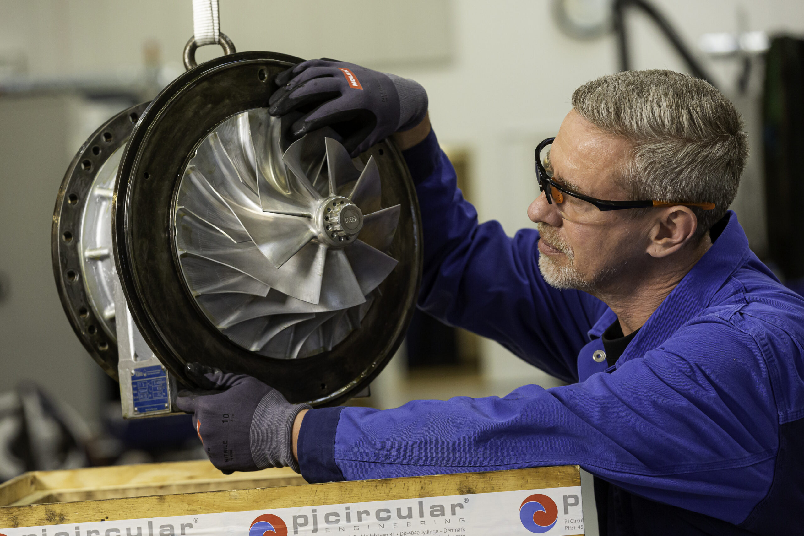 Service engineer putting a turbocharger in a box